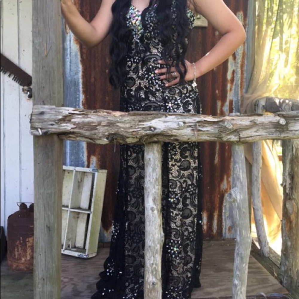 Nude and black embellished prom dress